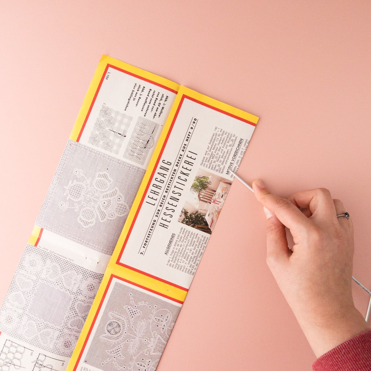 Fold sheet from a magazine and fold with addi jacket knitting needle