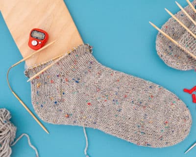 Premium Photo  Girl knits sock knitting needles