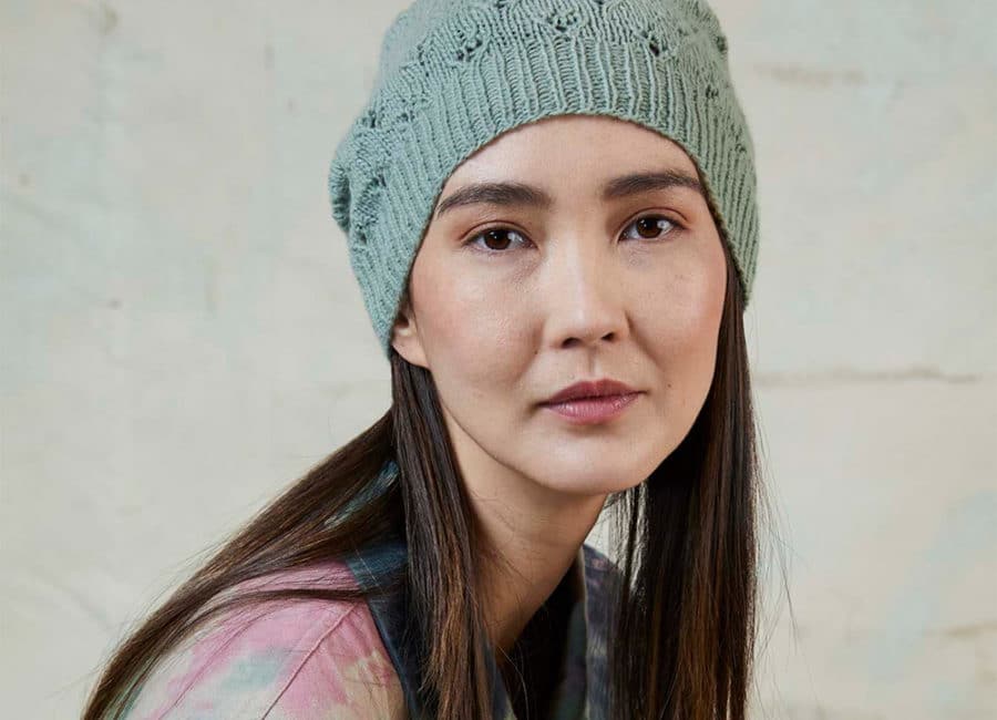 Knit beanie with lace pattern