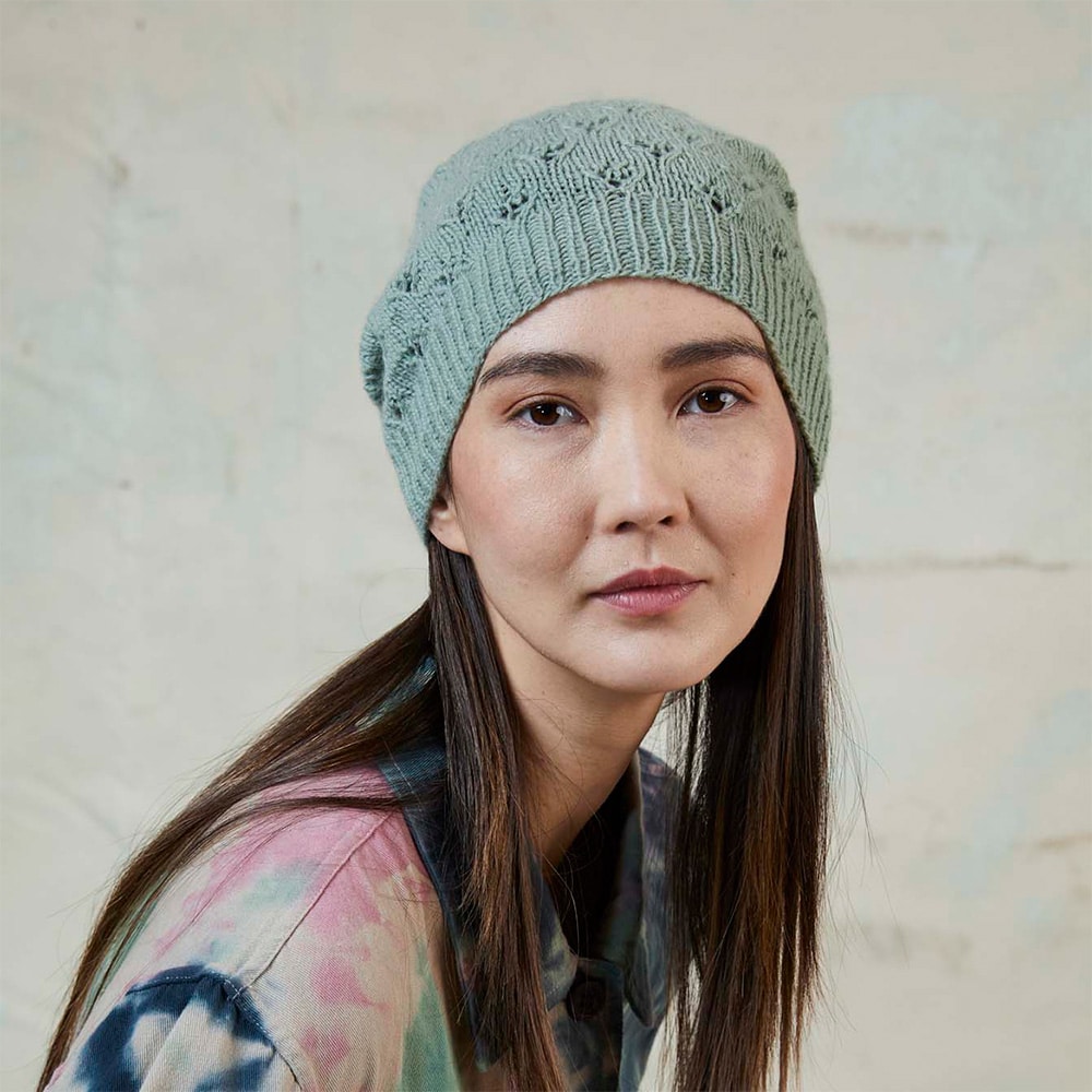 Knit beanie with lace pattern