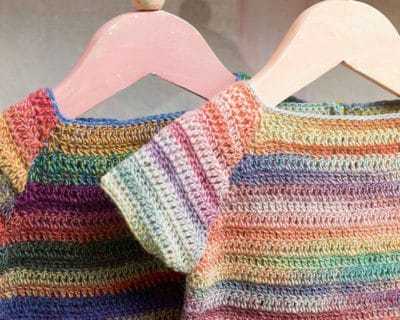 Hakelkleid Lang Mille Colori Baby detail Häkelkleid für Babys