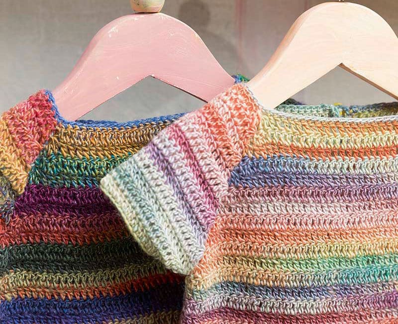 Hakelkleid Lang Mille Colori Baby detail Häkelkleid für Babys
