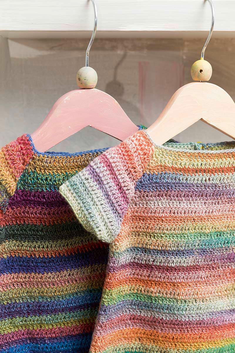 Hakelkleid Lang Mille Colori Baby detail Häkelkleid für Babys